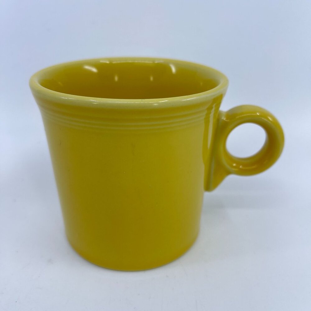 vintage fiesta sunflower yellow ceramic coffee mug by hlc usa
